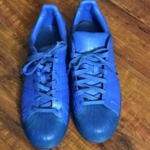 Bright blue Adidas brand shell toe tennis shoes